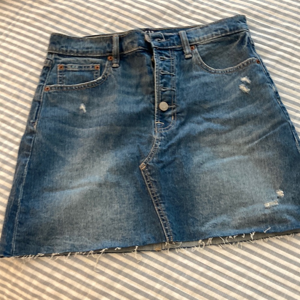 GAP denim mini skirt.  Like new. Lightly distressed denim. Button fly. Size 4.
